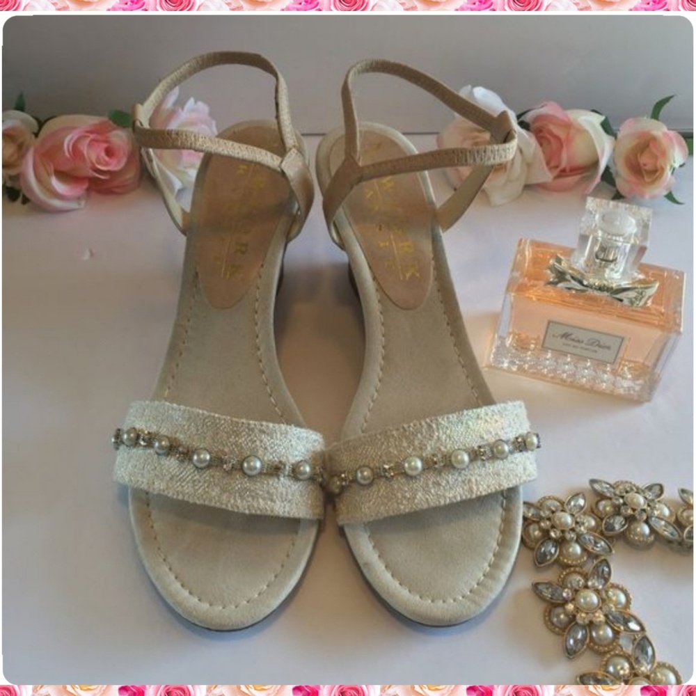 Elegant cream color low wedge heel sandals